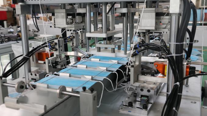 Łatwa w obsłudze automatyczna chirurgiczna maszyna do produkcji masek na ucho 0